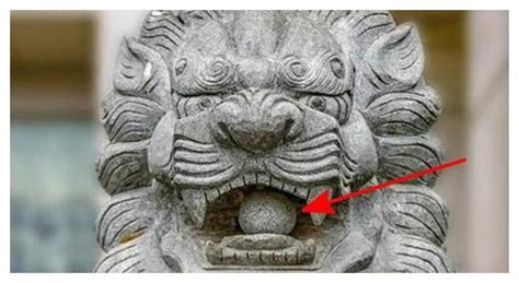 石獅子嘴里為什么放石球,石獅子嘴里為什么放石球呢縮略圖